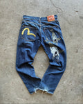 Evisu blue denim jeans with koi fish embroidery and logo, vintage Japanese style.