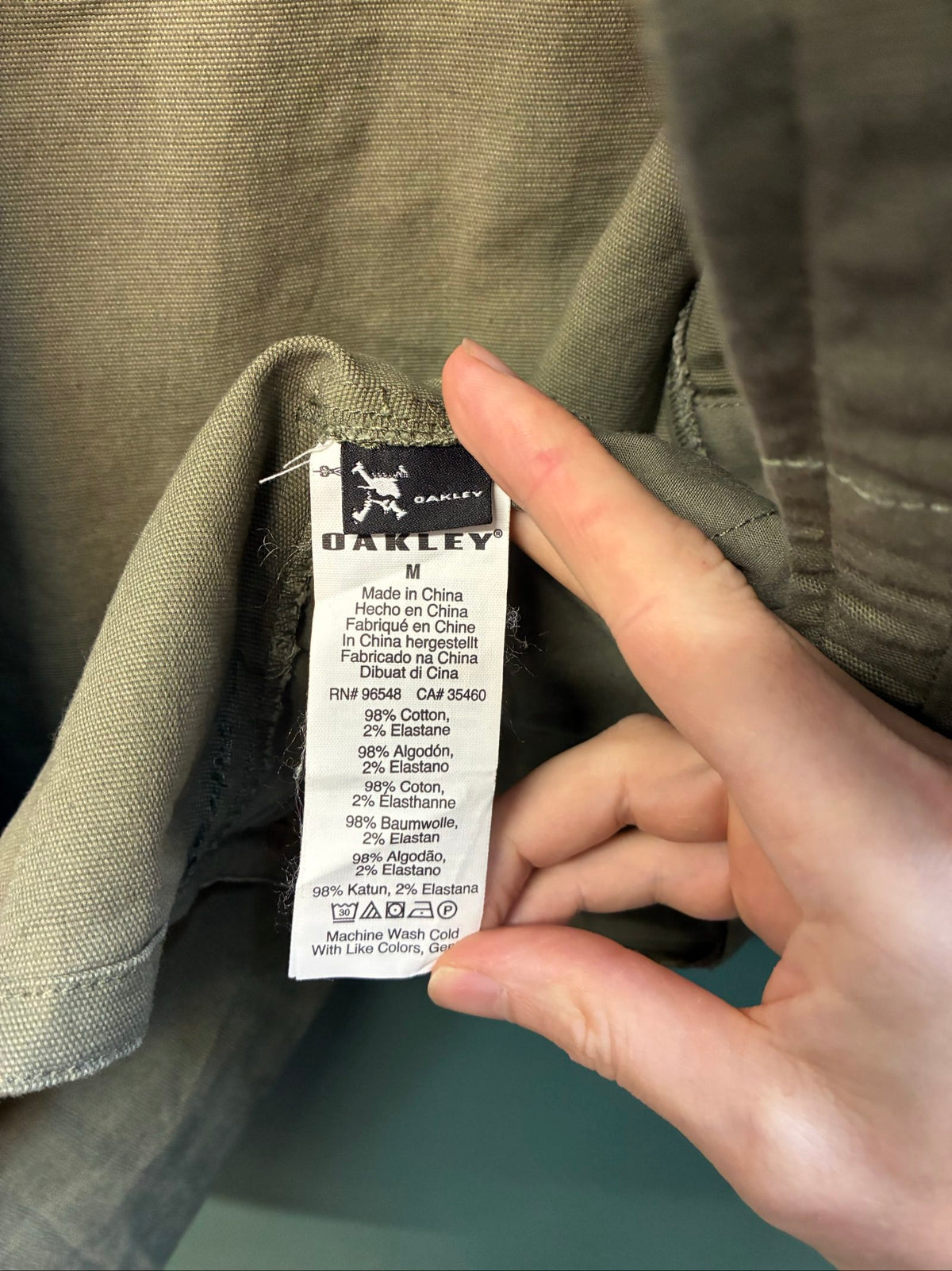 Oakley khaki military field jacket with breast and side pockets, regular fit.