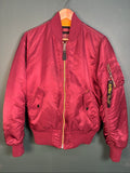 Alpha Industries burgundy bomber jacket reversible with yellow and red accents, excellent condition.