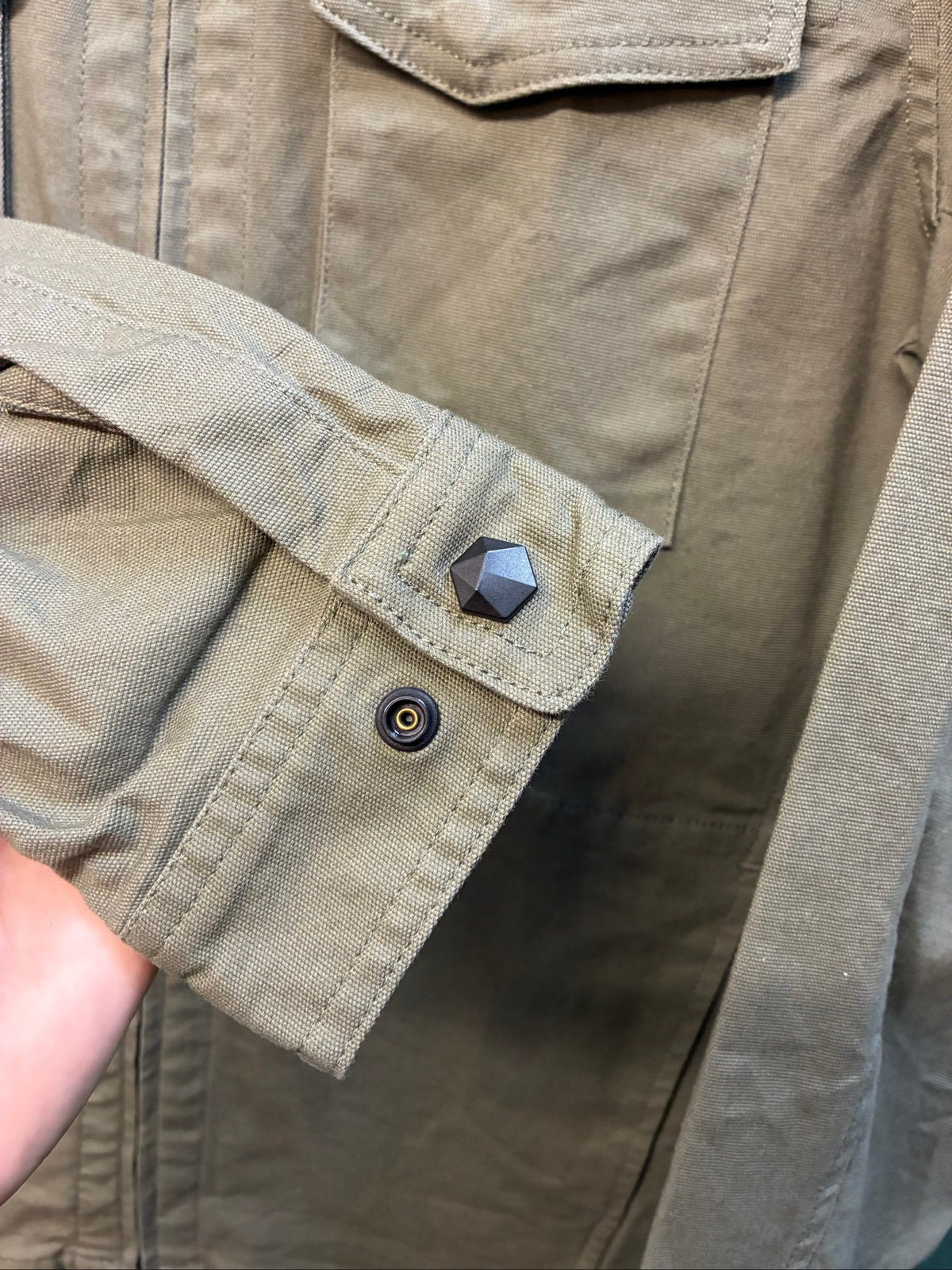 Oakley khaki military field jacket with breast and side pockets, regular fit.