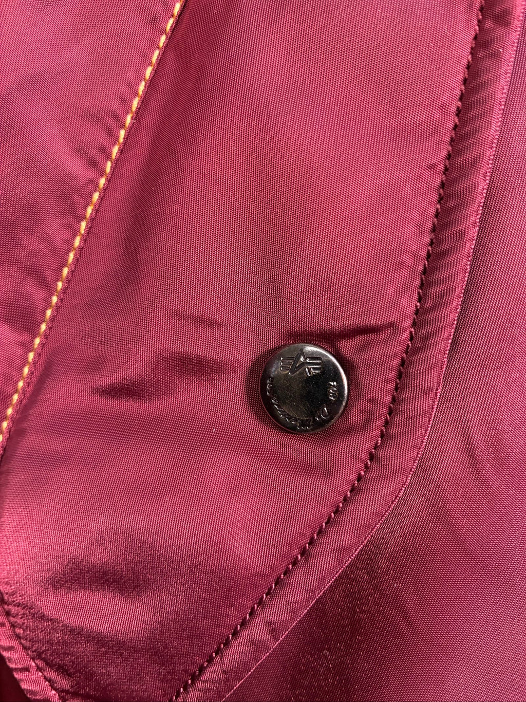 Alpha Industries burgundy bomber jacket reversible with yellow and red accents, excellent condition.