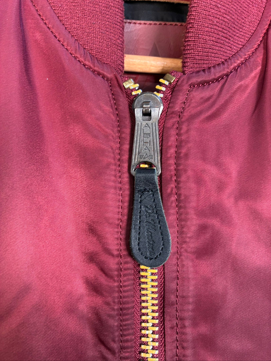 Alpha Industries burgundy bomber jacket reversible with yellow and red accents, excellent condition.