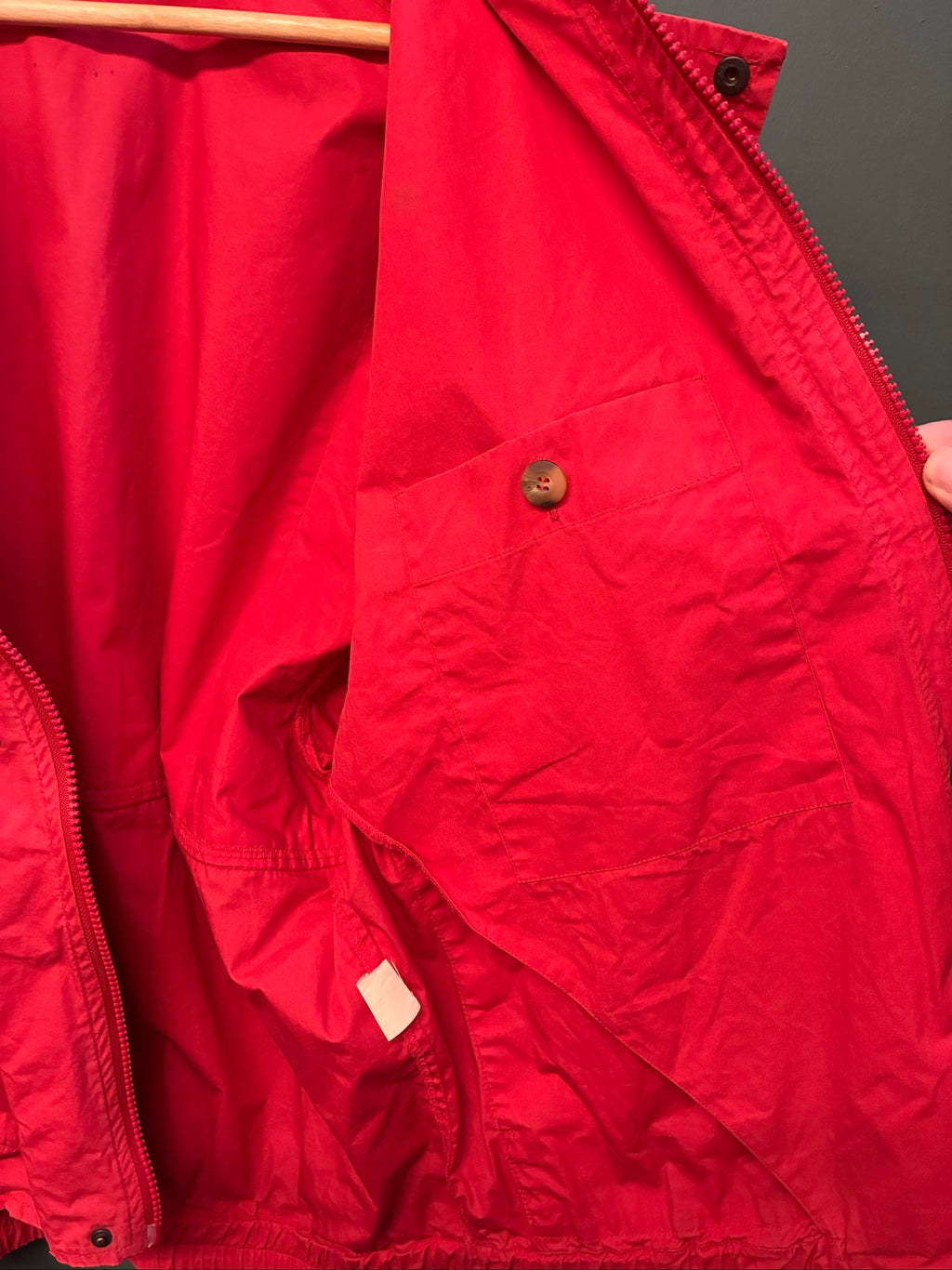 Marlboro vintage red cotton jacket with hood, snap pockets, subtle branding, 80s style.