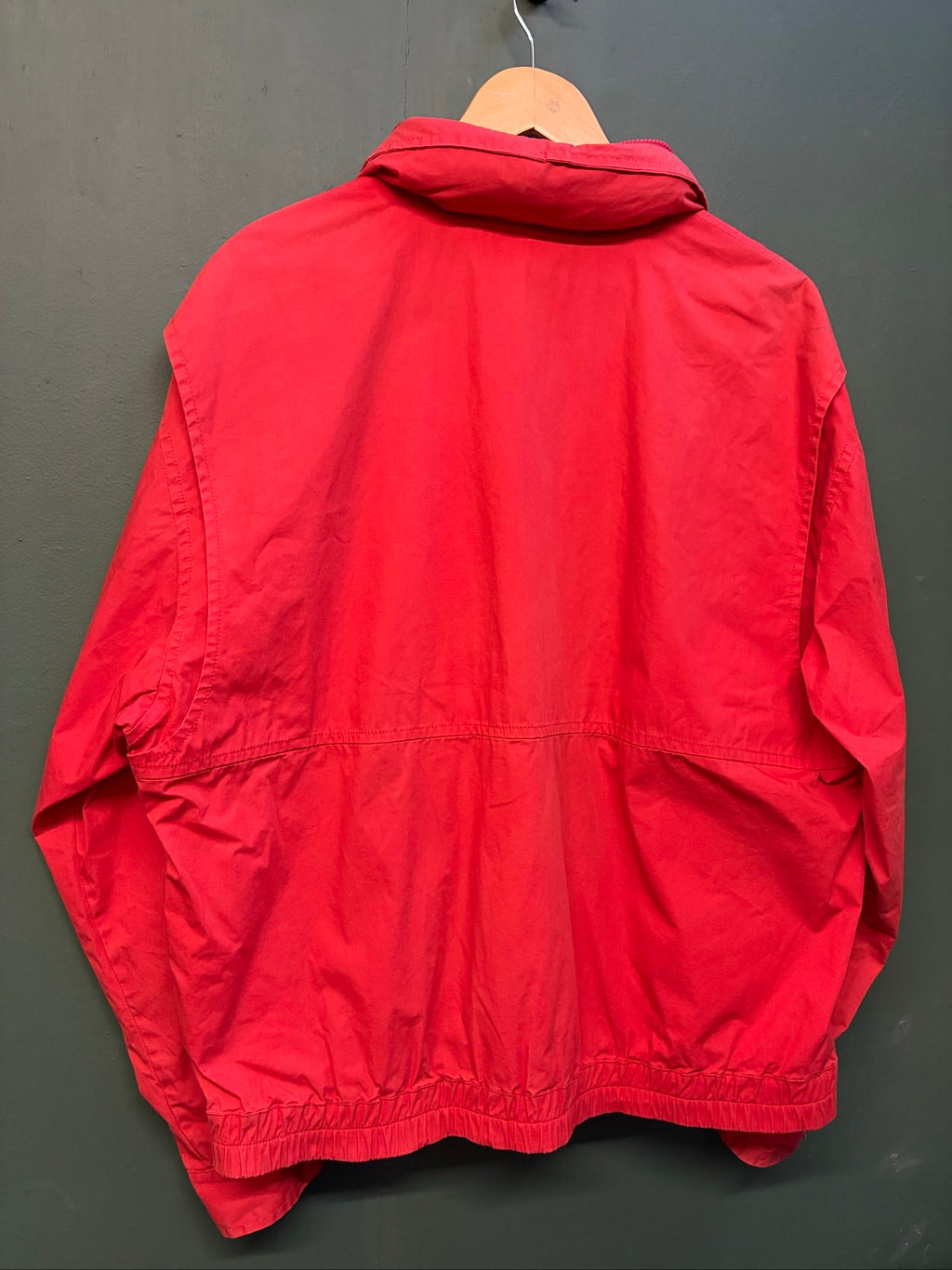 Marlboro vintage red cotton jacket with hood, snap pockets, subtle branding, 80s style.