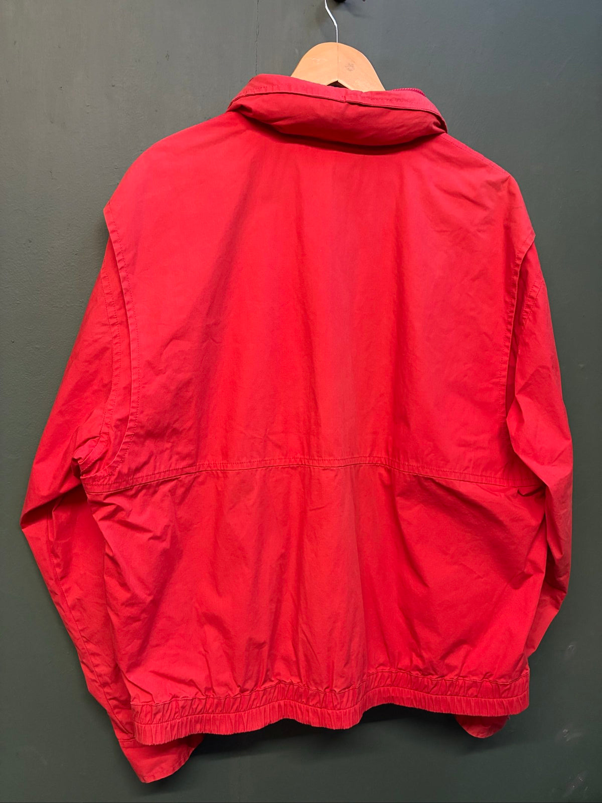 Marlboro vintage red cotton jacket with hood, snap pockets, subtle branding, 80s style.