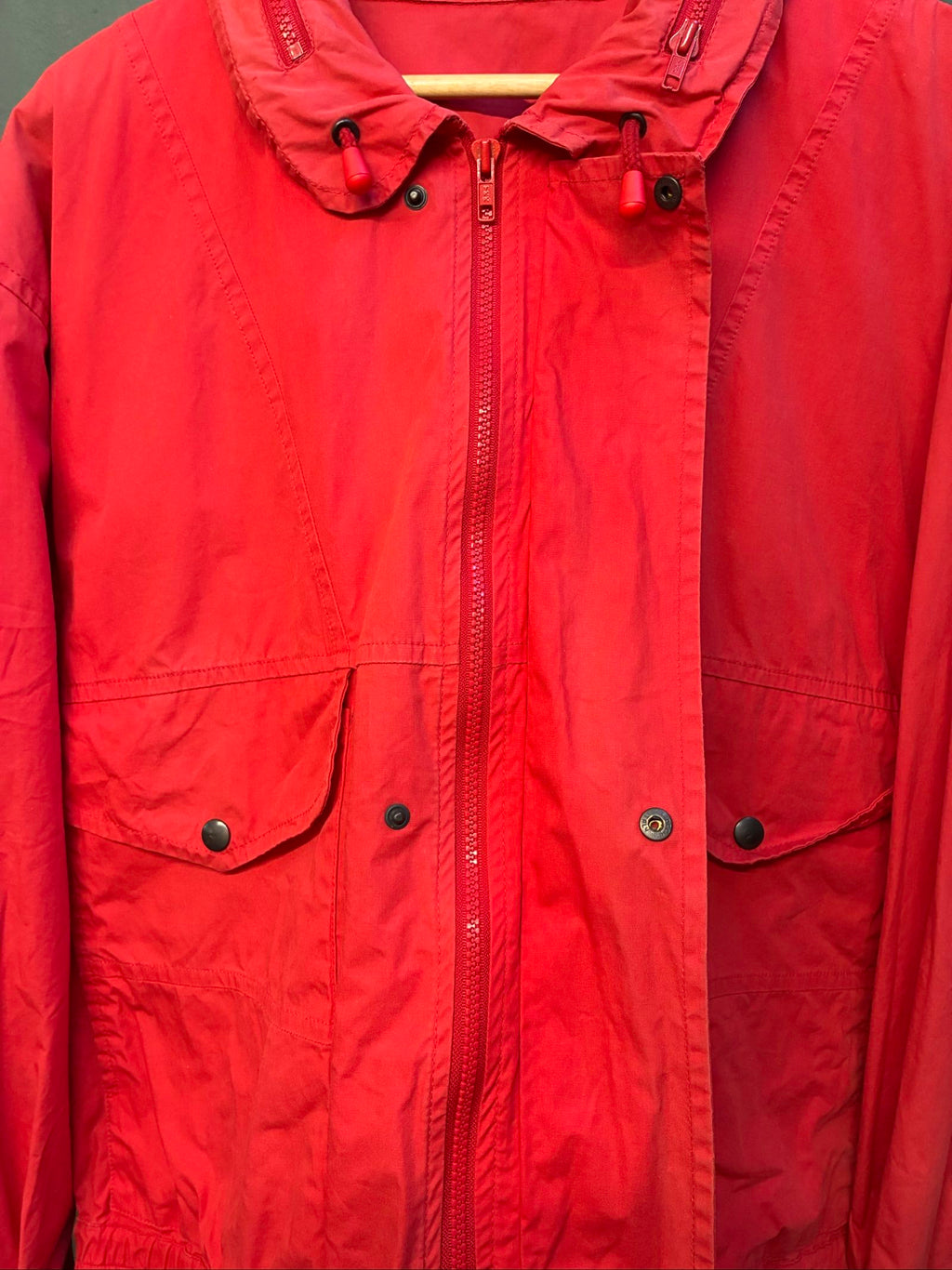 Marlboro vintage red cotton jacket with hood, snap pockets, subtle branding, 80s style.
