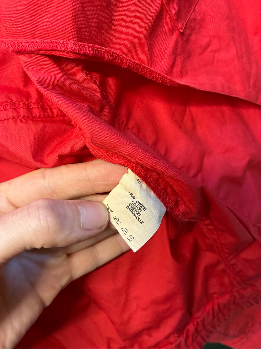 Marlboro vintage red cotton jacket with hood, snap pockets, subtle branding, 80s style.