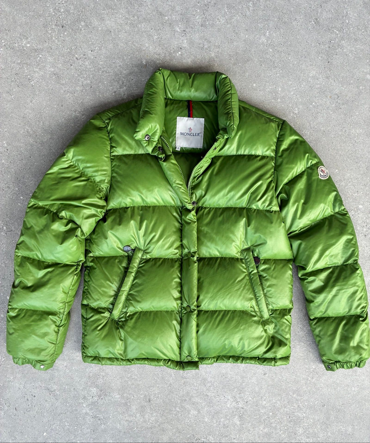 Moncler green puffer jacket with logo, 2004-2008, small oil mark below left arm.