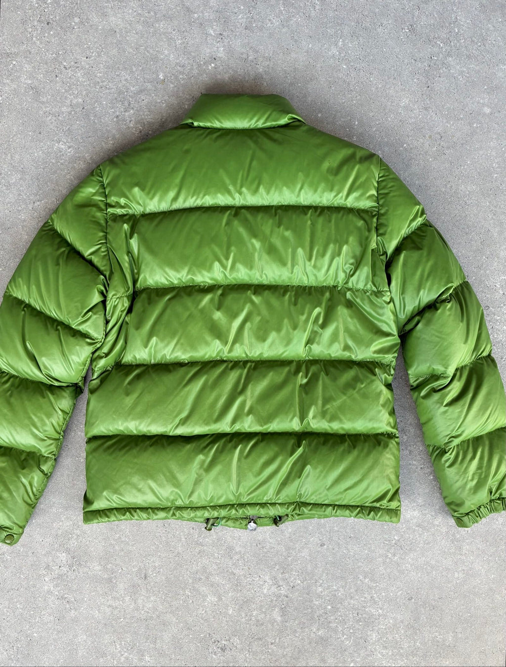 Moncler green puffer jacket with logo, 2004-2008, small oil mark below left arm.