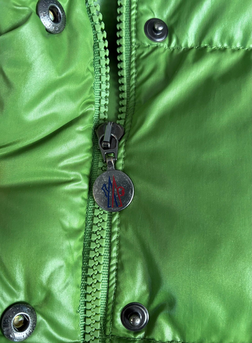 Moncler green puffer jacket with logo, 2004-2008, small oil mark below left arm.