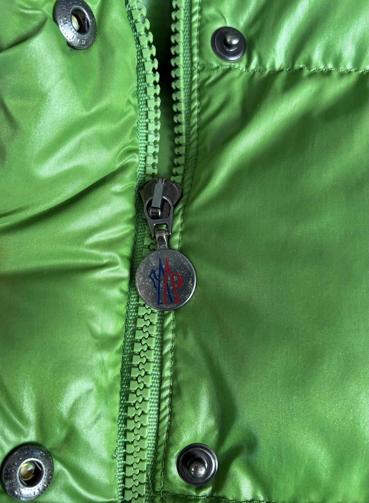 Moncler green puffer jacket with logo, 2004-2008, small oil mark below left arm.