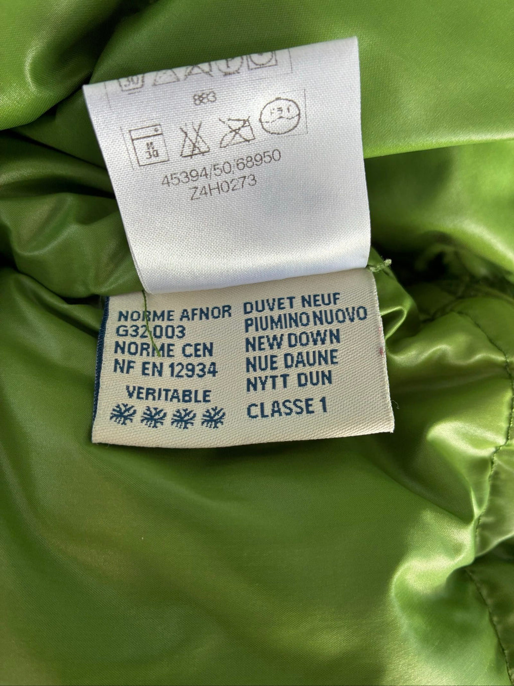 Moncler green puffer jacket with logo, 2004-2008, small oil mark below left arm.