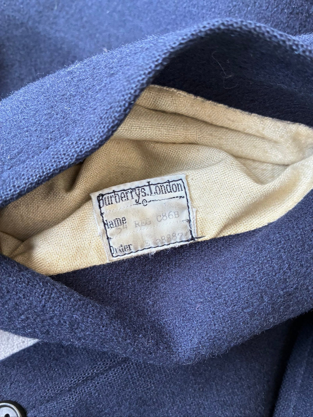 Burberry navy coat wool alpaca blend with checked lining and original belt.