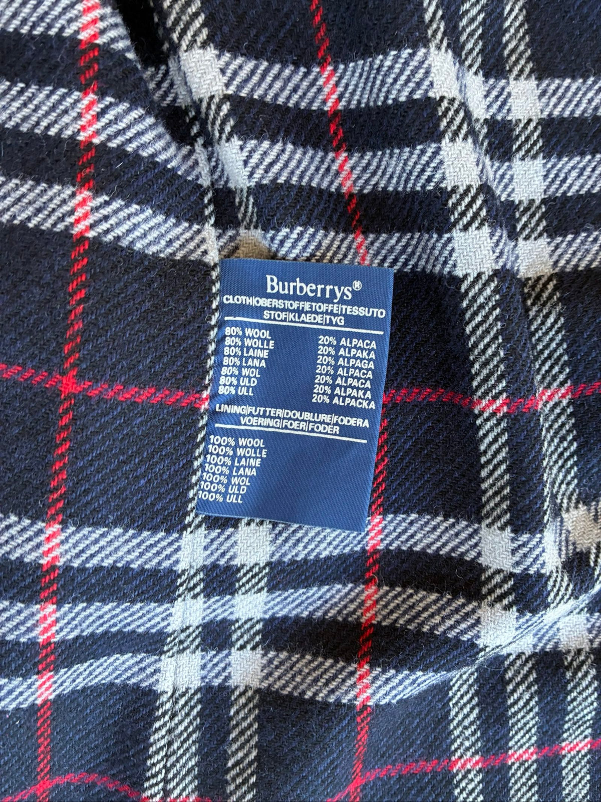 Burberry navy coat wool alpaca blend with checked lining and original belt.