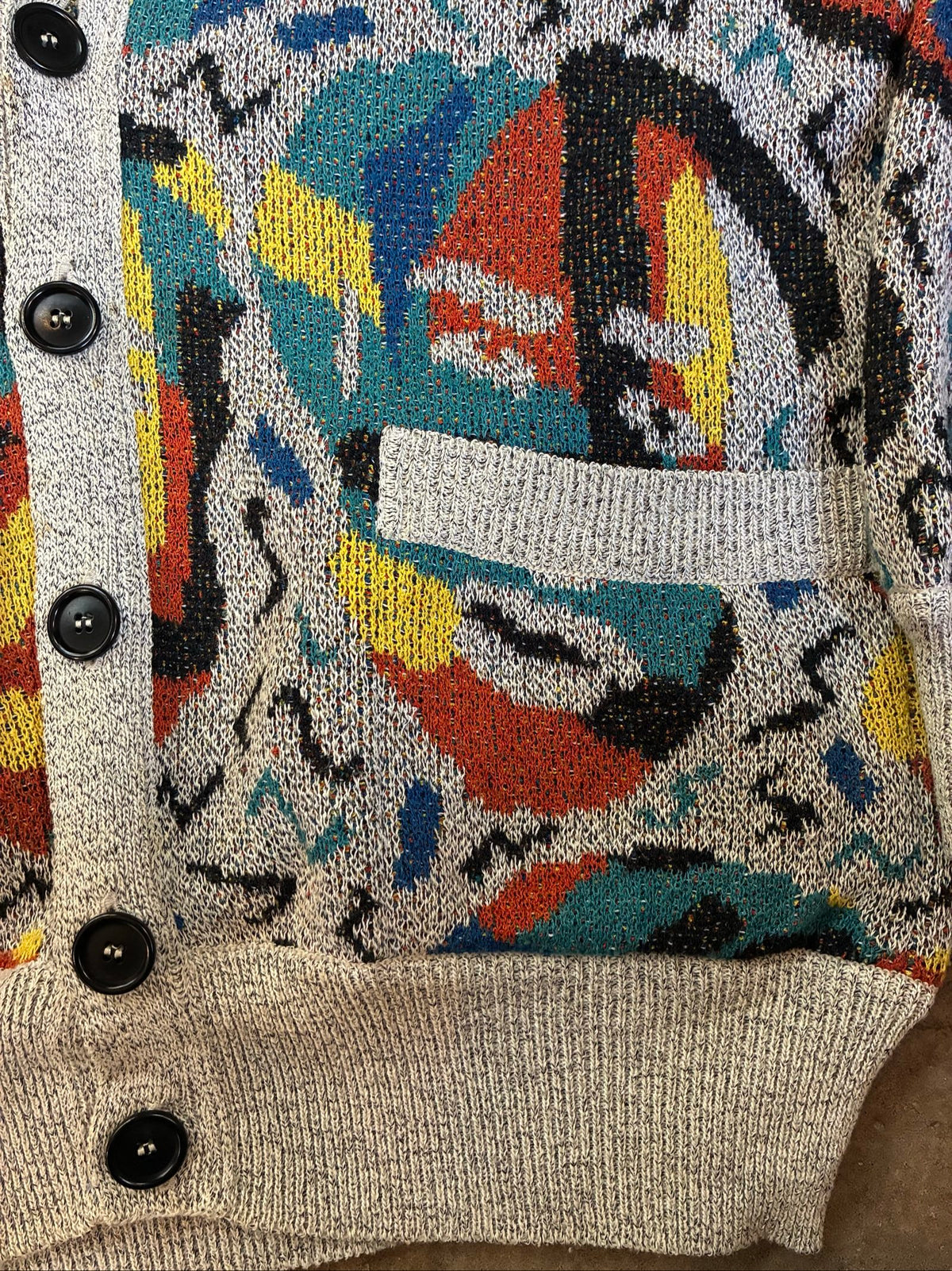 Missoni grey, orange, yellow cardigan with abstract Picasso knit pattern and oversized fit.