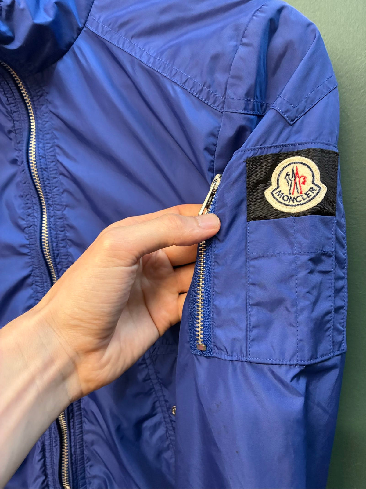 Moncler blue lightweight bomber jacket with logo, good condition, light surface marks.