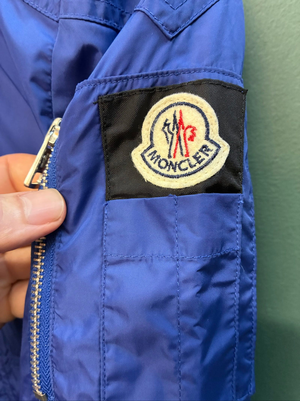 Moncler blue lightweight bomber jacket with logo, good condition, light surface marks.