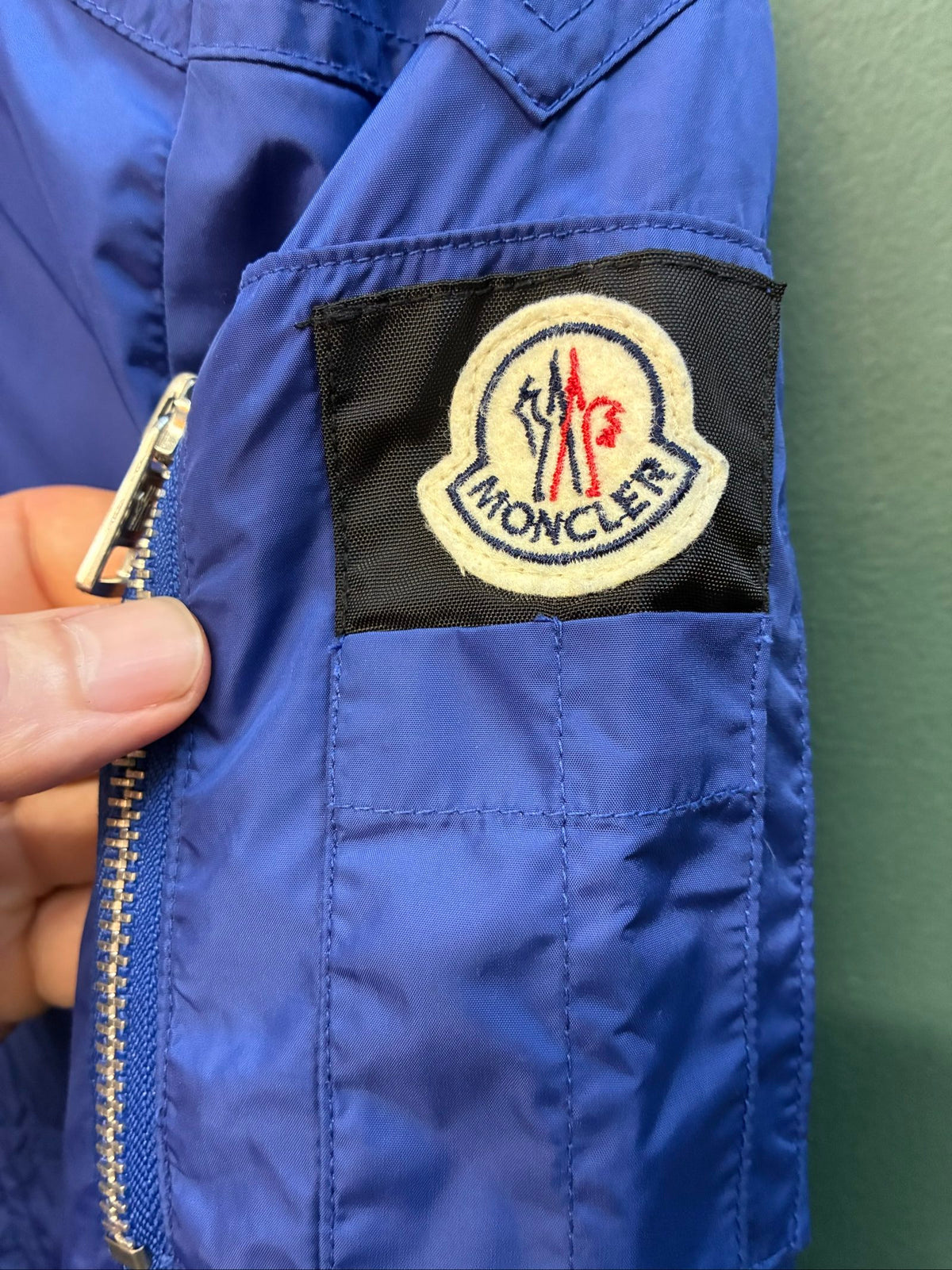 Moncler blue lightweight bomber jacket with logo, good condition, light surface marks.