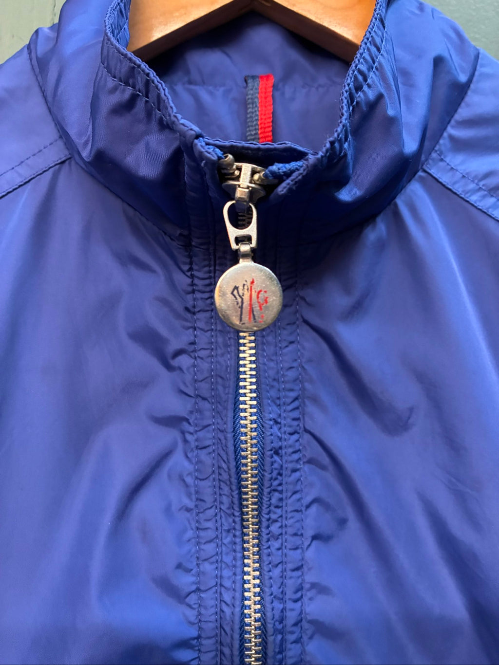 Moncler blue lightweight bomber jacket with logo, good condition, light surface marks.