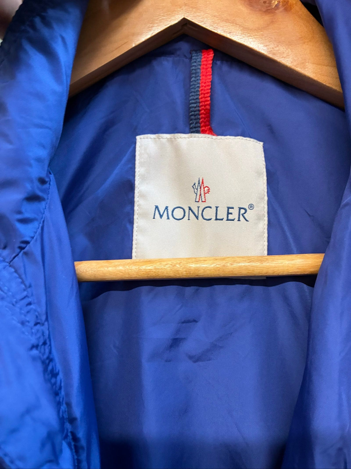 Moncler blue lightweight bomber jacket with logo, good condition, light surface marks.