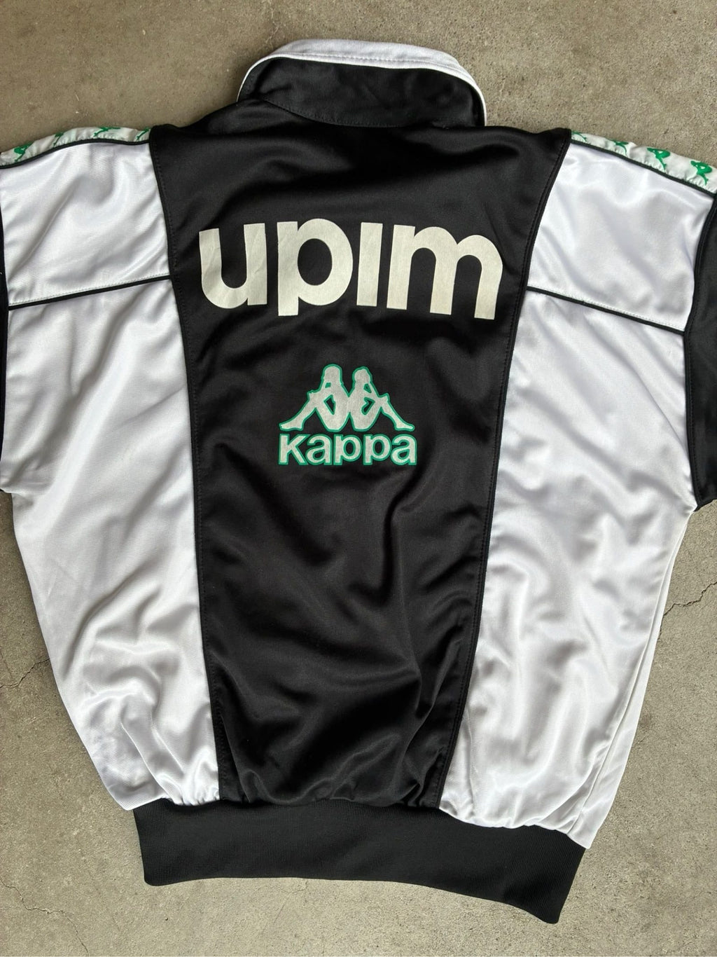 Kappa vintage Juventus track jacket black green white with logo and 90s design.