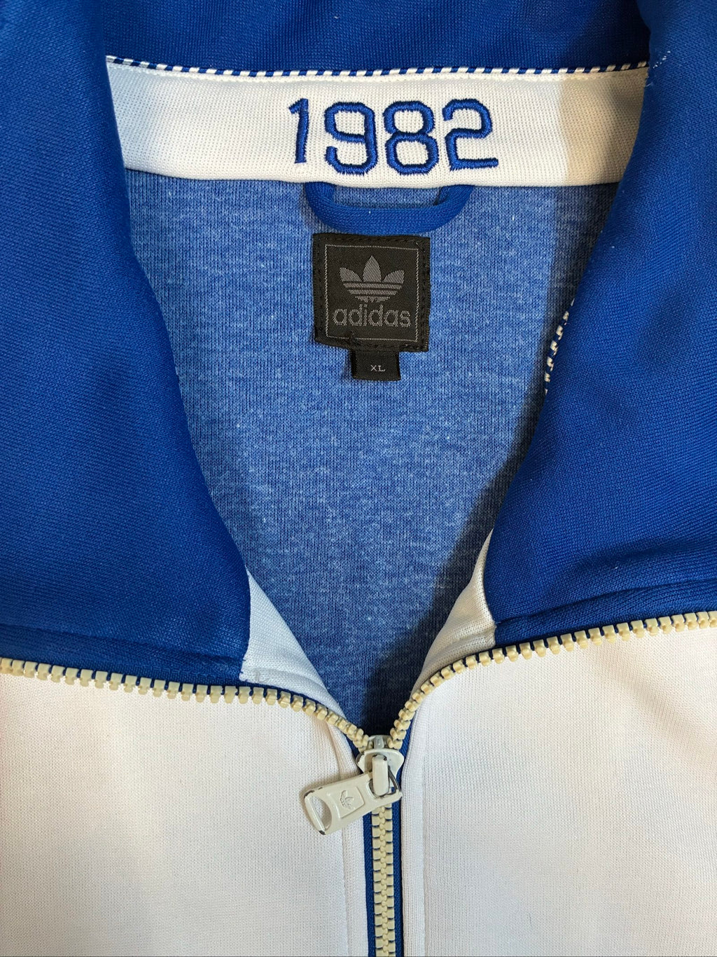 Adidas Originals vintage track jacket white and blue, full zip, detailed zip pullers.